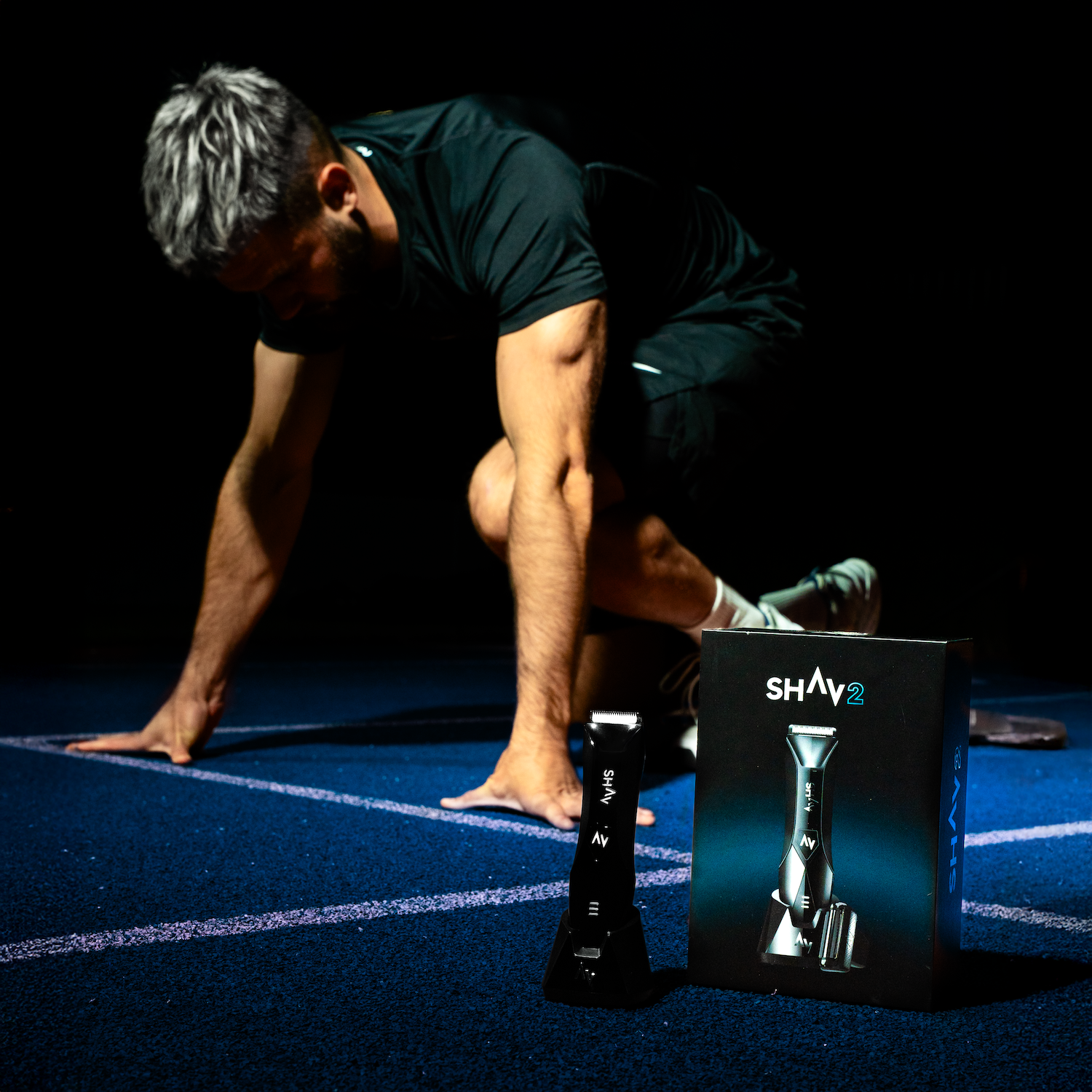 shav 2 trimmer on the stadium track with a man getting ready for race start